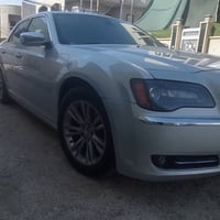 أوباما  كرايسلر 12 گير عصا محرك وگير وتبريد وتدفئه وگشر وكلشي جااااهز ...