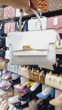 شنطة نسائية • شغل توب