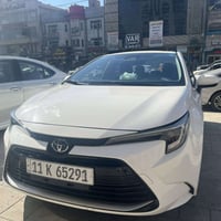 كورلا هايبرد شكلٍ امريكي 2025 مرقم بغداد  ماشية 7800 كيلو  مكفولة كفال...