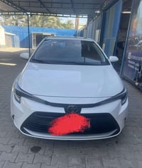 للبيع كورلا هايبرد 2025 رقم بغداد ماشيه ٦ الاف  كيلو سياره بعدهه زيرو ...