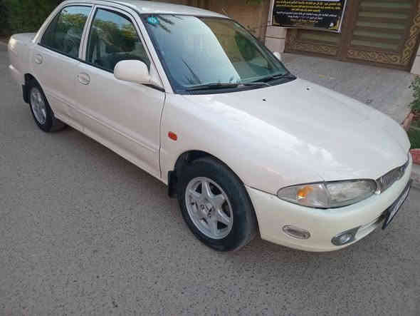 السلام عليكم للبيع بروتون ويرا موديل 2004 كير اتوماتك باسمي الرقم الدولي هزه جديده سنويه جديده بيها قطع صبغ بدون تبديل بدون اي ضربه مجرد شخوط بدون تحميل معجون وصبغ درجه اولى*********** كير ومحرك وكهربائيات وتبريد وتدفئه كلها شغاله *********** مكان السياره بغداد العامريه السعر 55$ السياره حلوة وناعمه وبالعافيه الياخذها واحلى من الصور وتحياتي للجميع بغداد
