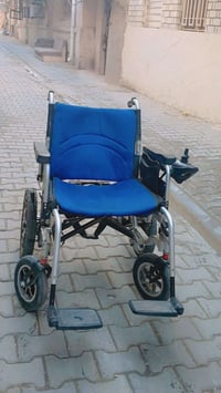 عيني كرسي ذو الحاجات الخاصه للبيع 300 بي مجال07806557309
