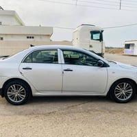 كورلا 2013 خليجي مكفول لاصبغ ولا تبديل گير ومحرك كفاله  صدر امامي خلفي...