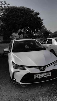 عندي كورلا هايبرد ٢٠٢٥ فول مواصفات تجميع صيني ماشية ٣٠ الف بيها قطعة و...