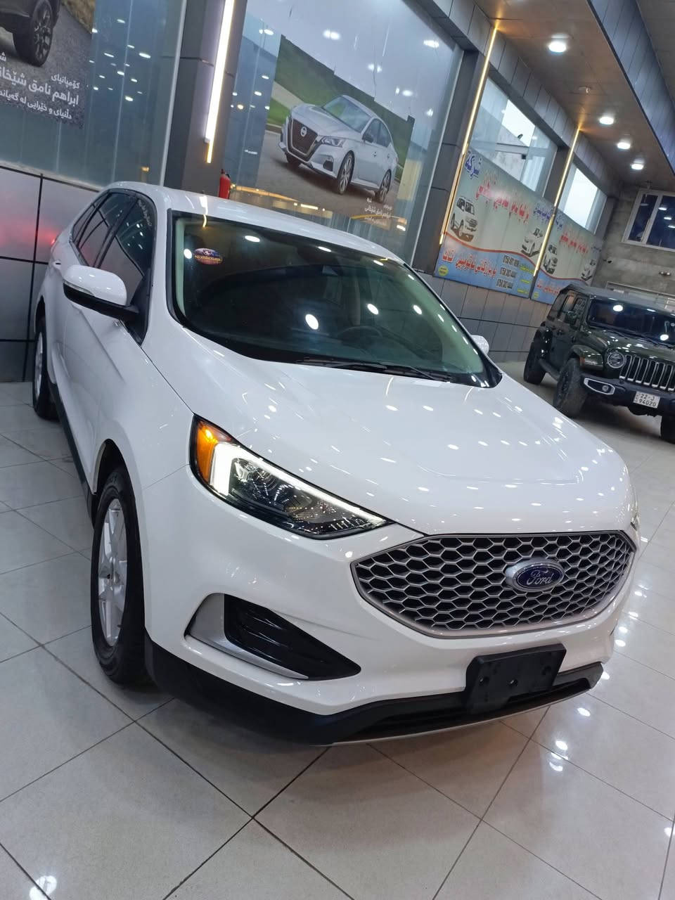 𝐅𝐨𝐫𝐝 𝐄𝐃𝐆𝐃 SEL
فورد ايدج موديل : 2024 

اللون ابيض 

حجم المحرك : 2.0L TURBO ( 4.سلندر )
 سيارة بدون ارباك بجم كبس 
 الضرر بابين جاملغ خلفي صبغ
رقم كاتى اربيل 
دواخل اسود بيلادي
بصمة ابواب 
بصمة تشغيل 
بريك بصمة
كير ماوس
شاشة كبير ( تيسلا ) 12 انج
كاميرة
اوتو ستارت ( Auto Stard )
اوتو ستوب ( Auto Stop )
تحديد سرعة
تحديد مسار
رادار امامي 
رادار جانبي 
رادار خلفي 
حساسات امامي 
حساسات جانبي 
حساسات خلفي 
نظام : ECO
نظام : NORMAL 
نظام : SPORT
كشنات كهربائي 
تبريد لمس
تبريد مركزي
لايتات زينون بيلادي
بكلايتات ليد بيلادي 
بعد هواية مواصفات…

مكان اربيل داخل معرض 

ا‎للاستفسار اكثر الاتصال علی هذ

الرقم كورك او واتساب 

***********
