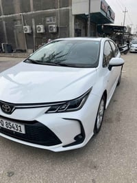 كورلا هايبرد • ماشيه ٢٠٠٠٠ كم • رقم بغداد