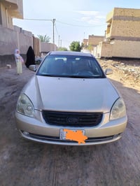 اوبتيما خليجي ٢٠٠٧ مكينة ٢٠٠٠ دوش رقم بغداد مشروع وطني باسمي ب٩٠ وبيها...