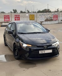 كورلا 2024 وارد امريكي سياره بيها جاملغ بنيد  الباقي كفالة عامة فئه LE...