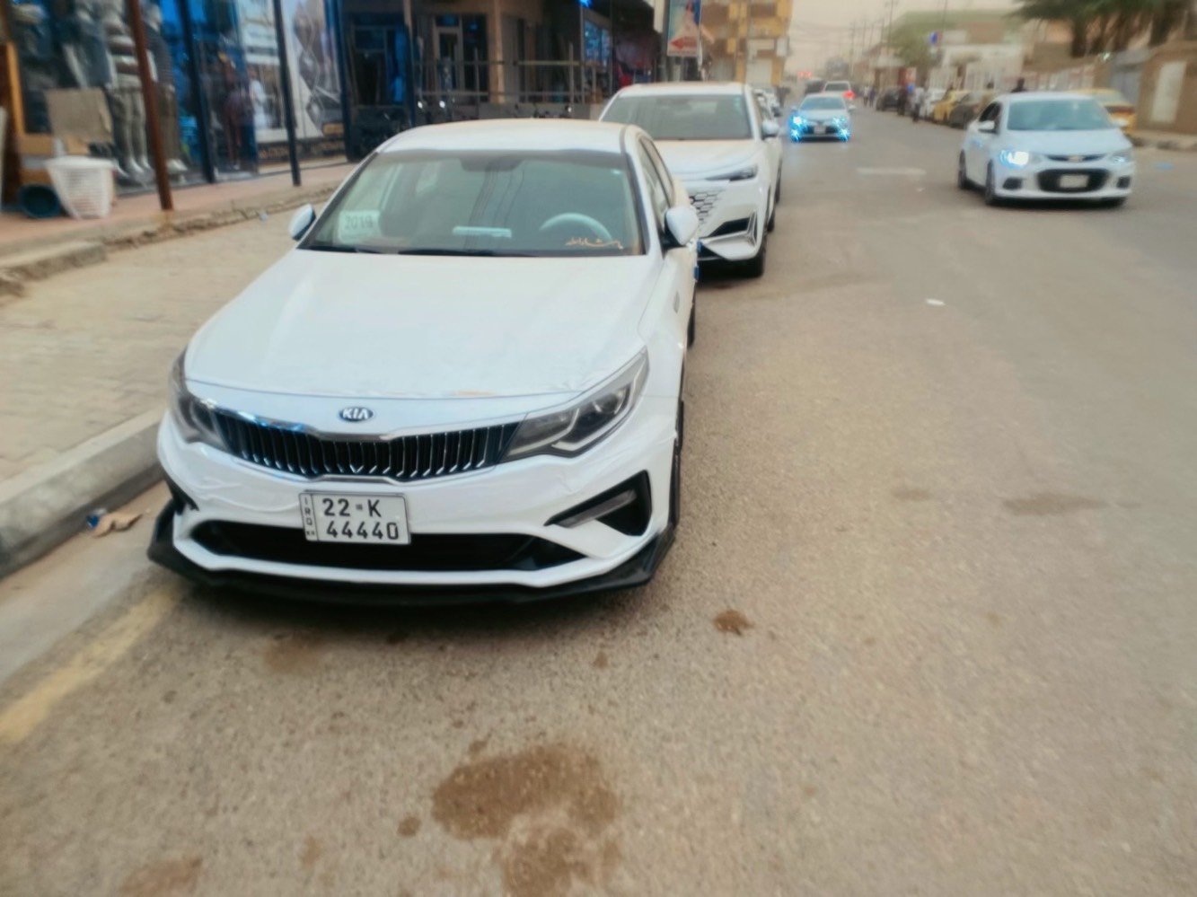 ✨ للبيع كيا اوبتيما خليجي 2019 ✨✨

✨ محرك 2400 DOHC - 185 حصان ✨✨



✨ ويل 18 انج ✨ رقم مميز ✨✨



**المواصفات الميكانيكية:**



✨ المحرك: 4 سلندر 2.4L DOHC 16V MPI



✨ القوة: 185 حصان @ 6000 rpm



✨ العزم: 241 نيوتن.م @ 4000 rpm



✨ الگير: 6 سرعات اوتوماتيك سبورتماتك + تبترونك



✨ وضعيات القيادة: Eco / Normal / Sport



✨ الدفع: امامي FWD



✨ الصرف: 24 داخل / 33 خارج / 27 مشترك MPG



✨ التانكي: 70 لتر



✨ الباتري: 80 امبير AGM



**الابعاد:**



✨ الطول: 4855 ملم



✨ العرض: 1860 ملم  



✨ الارتفاع: 1465 ملم



✨ قاعدة العجلات: 2805 ملم



✨ الخلوص: 135 ملم



✨ الصندوق: 450 لتر



✨ الوزن: 1465 كغم



**المواصفات الخارجية:**



✨ ويلات 18 انج المنيوم دايموند كت



✨ تايرات 235/45R18 جديدة



✨ اضوية امامية ليد بروجكتر + DRL



✨ اضوية خلفية ليد



✨ مري كهربائية + تدفئة + طي + اشارة



✨ حساسات خلفية + كاميرا HD



✨ بصمة ابواب + تشغيل عن بعد + دخول ذكي



✨ فول مواصفات عدا البنوراما



**الداخلية والرفاهية:**



✨ شاشة 8 انج لمس + GPS + CarPlay + Android Auto



✨ بلوتوث + USB + AUX + 6 سماعات + صب ووفر



✨ تكييف ثنائي Dual Zone + فتحات خلفية



✨ تدفئة ستيرن + تدفئة مقاعد امامية



✨ مقاعد جلد + كهربائية + ميموري للسائق



✨ كروز كنترول + تحكم ستيرن



✨ زجاج كهربائي اوتو 4 ابواب



✨ مراية وسط تعتيم تلقائي



✨ اضاءة داخلية ليد + ستائر خلفية



**الامان:**



✨ 6 ايرباك



✨ ABS + EBD + BA + ESC + TCS



✨ النقطة العمياء BSM



✨ مغادرة المسار LKA  



✨ تنبيه المرور الخلفي RCTA



✨ حساسات ضغط الاطارات TPMS



**حالة السيارة:**



✨ نظيفة جدا شرط الفحص 

✨ صيانة وكالة وماشية قليل



**السعر:** 188 ورقة وبيها مجال



**المكان:** الانبار - الحبانية



**رقم الهاتف:** ***********



✨ اتصال + واتساب ✨