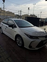 كورلا موديل 2024 مكفوله ماشيه 26 داخل احمر كرسي كهربا رقم بغداد  السعر...