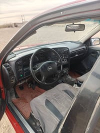 اوبل اميكا مصبوغة عام جمالية   محرك وكير مكفولات  موديل 1992 صدر جديد ...