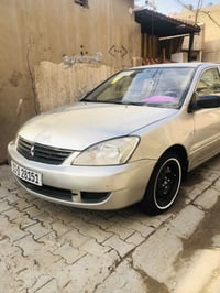 لانسر ٢٠٠٧ • رقم بغداد • جاهزة