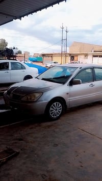 لانسر ٢٠٠٢ • رقم ميسان • مصبوغة