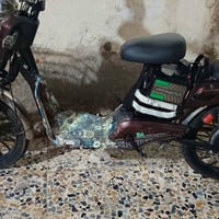 دراجه شحن فول مواصفات البطاريه مالته 100 والسعر 150 بيها مجال موصل باب...