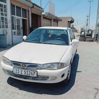بروتون ٩٧ • نص عمر محرك • رقم بغداد