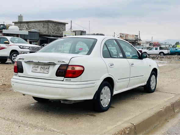 نیسان سەنی   2003
رەقەم بەخداد 
نموونە 200 هەزار رۆشتوە
هەموو گیانی لۆک 
چوارجام کارەبا گیر عادی
بی دعم بی لیدران نموونە
تایەیی تازە پێشوو دوا تازە 
تەبرید ساردوو گەرم بەشەرت
گیروو مەکینە تەقەو رەقە بەشەرت
سعری 55 $ گەلا
ژ.م ***********
***********
شوین  چمچمال شمشمل
