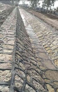 بناء حجر كرسته وعمل  تكسيه حجرية على شط... اسيجه..... ممرات..... سواقي...