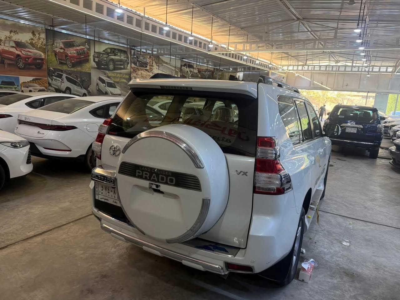 🔷 معرض الإمام المركزي 🔷
📍 العنوان: بغداد – الكريعات – شارع الوقف السني

⸻

🚘 تويوتا برادو 2014 VX
🔹 فول مواصفات – رقم بغداد

المواصفات:
 • بصمة فتح وتشغيل
 • مقاعد جلد
 • كراسي كهرباء
 • تبريد كراسي (أمامية + خلفية)
 • لايت زينون
 • زراك لايت
 • ستيرن كهرباء
 • 6 سلندر
 • محرك 4000
 • 7 ركاب
 • 3 قطع
 • عداد المسافة: 114,000 كم

الحالة:
 • السيارة بيها شخوط خفيفة (غير قوية) جهة عكس السائق
 • بارد بمقدار إصبعين بالبلب، والباقي مكفول

⸻

💰 السعر:315$
✔️ مجال بسيط

⸻

📞 للاستفسار:
***********
***********
