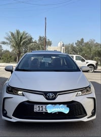 عندي كورلا هايبرد 2024 السيارة كفاله عامه من الصبغ والضربه والتبديل وا...