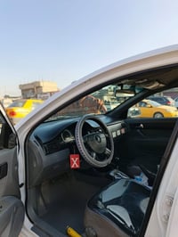اوبترا 14 ماشيه 97 الف كيلو متر  التايرات جدد دوشمه ارضيه جلد وكشنات ج...