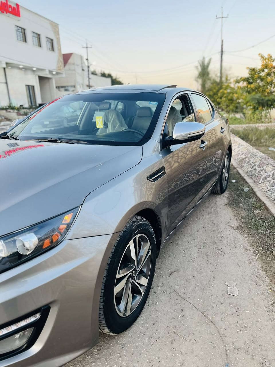 السلام عليكم ورحمة من رخصه الادمن للبيع كيا أوبتما موديل ٢٠١٣ السياره أمريكيه حادثه بس جاملغ امامي وصوره الحادث مرفق بل نشر وبل عراق بيه ٣ قطع صبغ  اثر جراد بدون دواخل بدون تبديل لغد وشاصي وحوض وتكم مكفولات  والباقي مكفول من كلشي مكينه ٢٤٠٠ GDI كير ومكينه وحداديه وتبريد وتدفئة مكفولات السياره فول الفول بصمه وبني راما حساس خلفي شاشه وكامره دواره تحكم استيرن كشنات كهربائيه وتدفئه وتبريد بل كشن مري شفط وأشاره بل مري هيتر بل استيرن حساس خلفي رقم بغداد انكليزي بسمي رقم وهزه وسنويه جدد
السعر ١٠٥ وبيه مجال 
الهاتف ***********//واتساب ***********
مكان السياره بابل محاويل قريه الفنديه مقابل بانزين خانه الفنديه 
علمن انو السياره مشيه ١١٠ ميل
