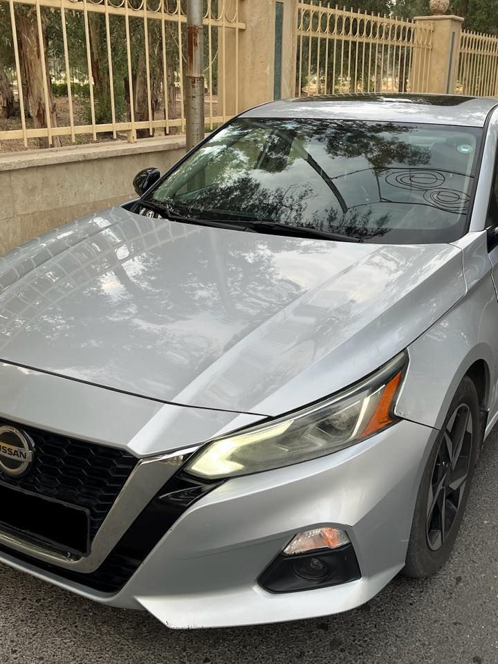 بسم الله الرحمن الرحيم
‏2021 Nissan Altima
سيارة واحد على واحد فول
السيارة كليين تاتيل
موجود فحص سونار
محرك 2500
مواصفات SR red
تنته(فتحة سقف)
كشنات جلد
كشنات تدفئة
حساس امامي
حساس خلفي
حساس جانبي
نظام تعليق خاص بالالتيما
كاميرا خلفية 360
شاشة كبيرة
بصمة
تشغيل عن بعد
نظام (sport - eco)
شفتات سبورت
ويل بلاك سبورت لمتد ادشن
تحديد مسار
السيارة رقم اربيل الجديد
هزه سنوية كلو جديد
للتوصل  اتصل على الرقم 
***********

