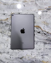 ايباد ميني ٥ • ٦٤ • زر التشغيل