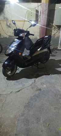 دراجه بانزين • مصبوغة كوريا • الدورة