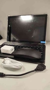 تابلت مع قلم وكيبورد وماوس نظام اندرويد  يأخذ دبل سيم كارت  يدعم خاصيه...