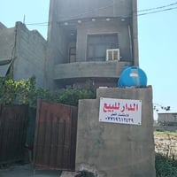مشتمل • ١٢٥م • باب الدرب