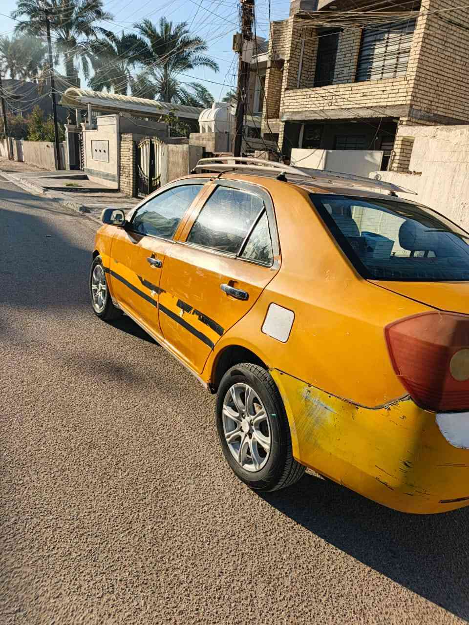 جيلي MK رقم بغداد جديد سيارة جاهزة مصفرة هيئة وغرامات السعر 25 رقم ***********
