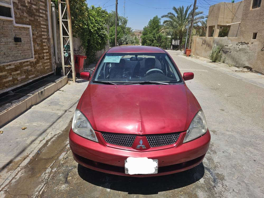 مسيبوشي لانسر 2011 رقم بغداد كير اوتماتيك نضيفه جدأ او ***********/*********** بغداد, العراق
