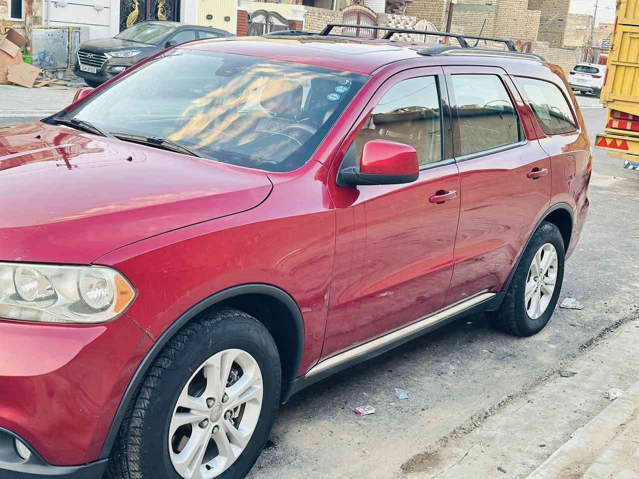 السلام عليكم
دورنكو موديل 2013 خليجي 
مكفولة من كلشي 
فول مواصفات 
لون كرزي 
فتحة سقف
‎ كشنات جلد 7راكب 
تدفئة تبريد 
كامرة خلفية حساس خلفي بلادي
محرك 3600
باقي التفاصيل بالصور 
السيارة بيه بارد مكانات بسيطة كما موضح بالسونار
ماشية (147الف) حقيقي 
السيارة مال جناي باسمي استخدام شخصي مال بيت 
السعر( 215) وبيه مجال للشراي 
مكاني بغداد رقمي للتواصل 
***********
