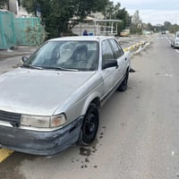 نيسان سني ياباني موديل 92 محرك 1800قبق اسود وكير اوتوماتيك مال حاويه ت...