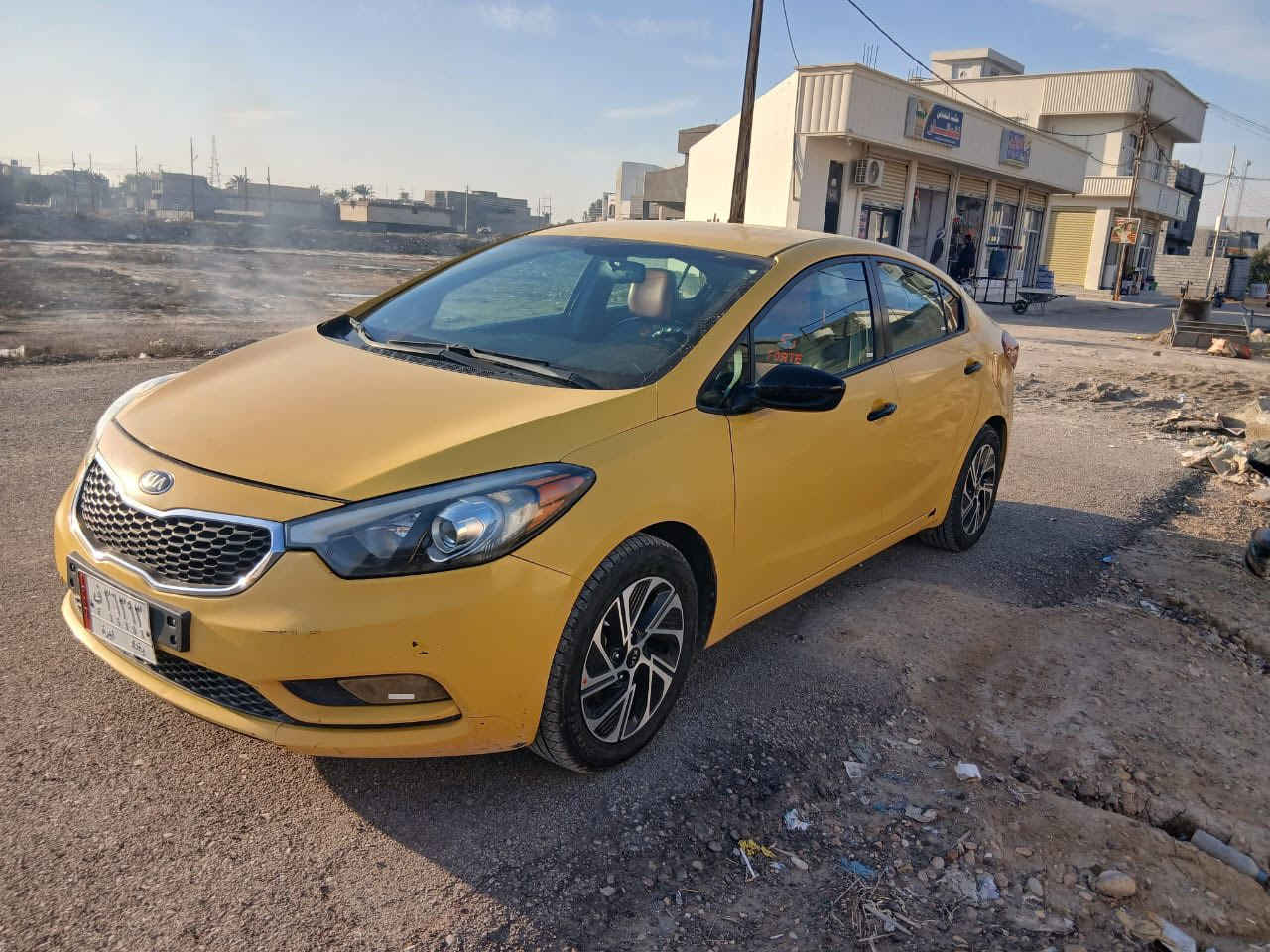 السلام عليكم كيا فورتي اصفر اللون (اجره) رقم بغداد بـ اسمي شرط التحويل حادثها بـ امريكا فقط جامرلغ امامي عكس السايق بدون لــاا دواخل ولا ارباك شرط … موديل 2015 مصفره هيئه وغرامات  كير مكينه صدر كهربائيات كلها شغاله ومكفوله .. تخم تاير جديد بطاريه جديده .. نص مواصفات مكاني ديالى بعقوبه ام الاعظام سعرها 115 وبيها مجال بسيط غير متواجد ع النت اتصل ع الرقم وادلل ‭0771 623 3550
