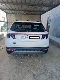 توسان ٢٠٢٤ خليجي مكفوله بغداد ب اسمي السياره جديده بصمه  شاشة  حساس ام...