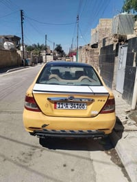 وبركاتهُ سيارة بي واي دي نوع F3 موديل 2011 بيها ضربة بالجاملغ الخلفي ف...