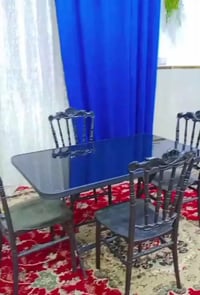 ميز و٤ كراسي • قفل • سفرة