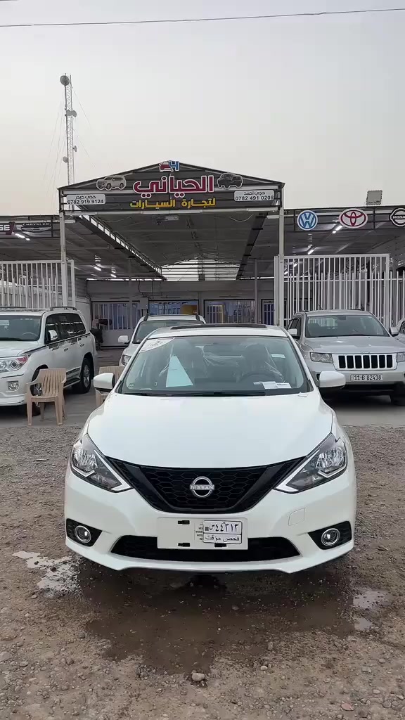 ✨ سيارة الأحلام لعام 2025 وصلت من **معرض الحياني**! ✨

نقدم لكم من **معرض الحياني** نيسان سنترا 2025 الجديدة كليًا، بتصميمها الأنيق وأدائها القوي الذي يجمع بين الفخامة والكفاءة! 🚀

استمتع بتجربة قيادة لا مثيل لها مع مواصفات تذهل العقول: 

*   **محرك قوي وفعال:** محرك 1600*4سلندر بقوة 149 حصان، يوفر لك تسارعًا رائعًا واقتصادًا في استهلاك الوقود يصل إلى 40 ميلًا للغالون على الطرق السريعة! ⛽️💨
*   **تصميم خارجي جذاب:** عجلات ألمنيوم قياس 18 بوصة، مصابيح LED أمامية مع إضاءة نهارية مميزة، تضفي عليها حضورًا لا يُنسى على الطريق. 🤩
*   **مقصورة داخلية فاخرة:** مقاعد رياضية مريحة بكسوة قماشية أنيقة مع خياطة متباينة، ومساحة داخلية واسعة لراحة جميع الركاب. 🛋️
*   **تقنيات متطورة:** نظام معلومات وترفيه سهل الاستخدام مع شاشة لمس، دعم Apple CarPlay و Android Auto، وميزات أمان متقدمة لحماية قصوى. 📱🛡️
*   **قيادة رياضية وممتعة:** وضعية القيادة الرياضية (Sport Mode) لتجربة قيادة أكثر حماسًا، ونظام تعليق متوازن يوفر ثباتًا وتحكمًا ممتازين. 🛣️
قطعتين تبريد 
شاشة كبيرة شاشة لمس 
أوتوماتيك 
❤️ضمان ثلاث سنوات او ممشى 100 الف أيهما اسبق❤️

لا تفوت فرصة امتلاك هذه التحفة الفنية من **معرض الحياني**! 💎

للاستفسار والتواصل، يرجى الاتصال على الأرقام التالية:

الحجي حيدر: *********** 📞
الحجي احمد: *********** 📞

سارعوا بالحجز، فالكمية محدودة! 🏃‍♂️💨

#نيسان #سنترا #2025 #معرض_الحياني #سيارة_جديدة #فخامة #أداء #اقتصادية #للبيع #العراق #سيارات_العراق #Nissan #Sentra #CarForSale #IraqCars
