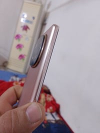 الهاتف مزود شريحتي SIM من نوع. ريدمي نوت 14 برو بلس 5G Nano SIM، بالإض...