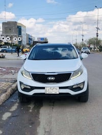 كيا سبورتج ٢٠١٤ (خليييجي) فول عدا البصمه رقم بغداد بأسمي  مكينة ٢٠٠٠ د...