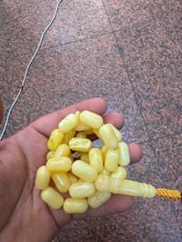 سبحه كهرب بولوني حر مابي اي شوائب وزن 66 غرام عدد الحبات 32 حبه سعر ال...