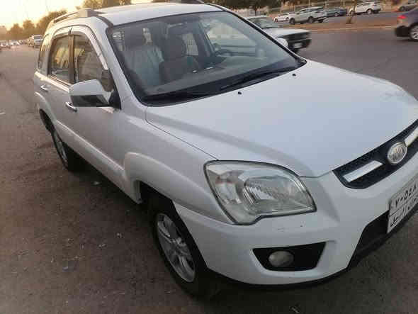 كيا سبورتج 2010 جديد بدون صبغ بدون تعديل ماشيه ١٤٣ الف سعر ١٢٥ رقم موبايل ***********
