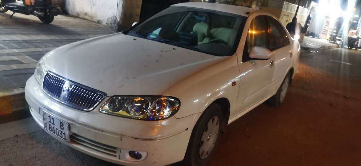 نيسان ٢٠٠٨ ياباني محرك ١٨٠٠ قبق اسود رقم انكليزي تدفئة تبريد بأسمي 
اربع جام كهربائية بيها حادث باب وشوية من الجاملغ موضح بلصورة ماشية ٧٥ الف سعرها ٩٦وبيها مجال سونارها وياها رقمي *********** العنوان الكاظمية
