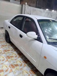 دايو نوبيرا موديل ٢٠٠٠ رقم بغداد محرك ٢٠٠٠ تبريد ثلج  كير اوتماتيك  تخ...