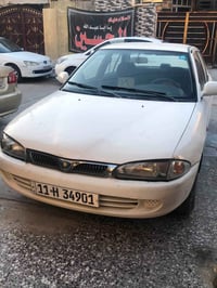 بروتون موديل 2005 كير محرك مكفولات تبريد شغال سيارة بدون صبغ بدون ضرر ...
