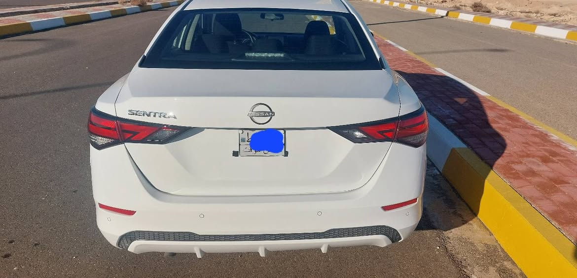 نيسان سنترا   2025 بدون رقم تترقم بغداد وكل المحافظات عليها لوحات فحص مؤقت
ماشية: 8000 وارد امريكي جديدة السيارة على وضع الشركة تبريد وراديترات 
 • محركها 2000، تشغيل بصمة، شاشة + كاميرا خلفية عالية الدقة وحساسات، نظام Auto Stop أمامي وخلفي، نظام Auto Off/On (إطفاء وتشغيل المحرك التلقائي)  نظام ECO اقتصادي باستهلاك الوقود
  تحديد مسار + نظام النقطة العمياء،  3 أنظمة قيادة (Sport / Eco / Normal) ، رادار، تبريد ثلج
الضرر صبغ راس البنيد فقط كما مبين بالصورة 
صاحب السيارة *********** خابر او وتساب
السيارة موجودة بالانبار
