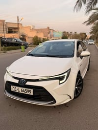 كورلا هايبرد ٢٠٢٤ • ماشيه ٣٠٠٠٠ كم • ضربة خلفية