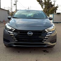 نیسان ڤێرسا 2025 مواسەفات SV ئەمریکی 2000روشتووە  بسمەیە پێش و پشت کەپ...