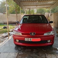 بيجو 2001سيارةمكفولةتبريد كير صدر سيارة جاهزة باسمي رقم الهاتف  077084...